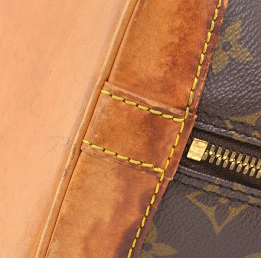 Alma cloth handbag Louis Vuitton Brown in Cloth - 10651930
