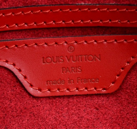 LOUIS VUITTON, a red 'Epi Soufflot' bag. - Bukowskis