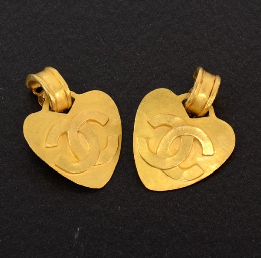 Authentic vintage Chanel earrings gold ear of rice CC logo round real