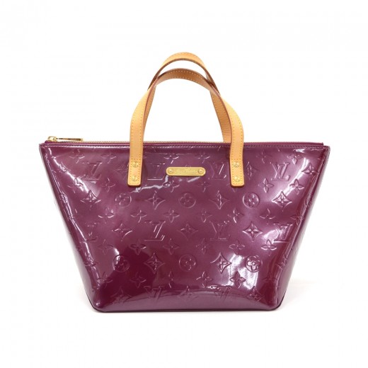 Louis Vuitton bag in purple leather and silver metal, is…