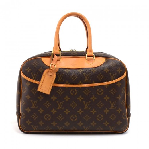 Sold at Auction: Louis Vuitton Brown Monogram Coated Canvas Deauville  Shoulder Bag, the exterior with an open side pocket and vachetta leather  handle