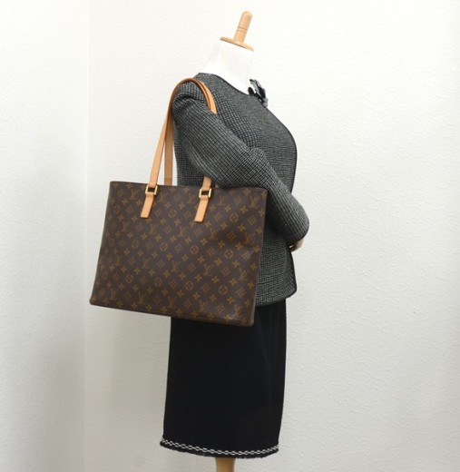 Luco cloth handbag Louis Vuitton Brown in Cloth - 34375066