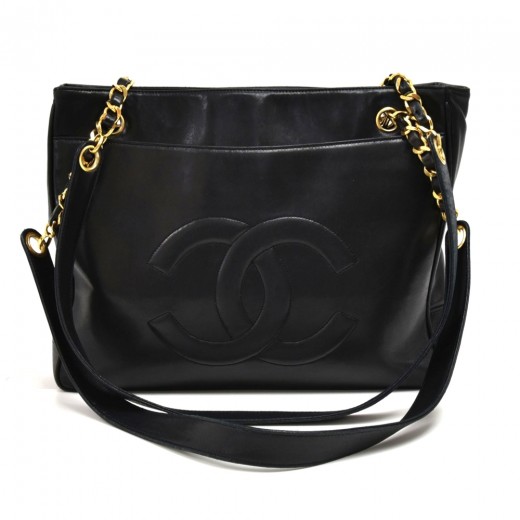 Authentic Chanel 2003 Black Solid Lambskin Leather Bag on sale at
