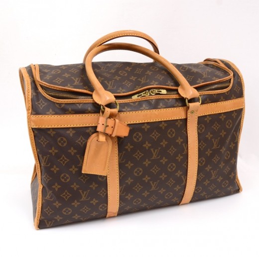Cloth travel bag Louis Vuitton Brown in Cloth - 20585755