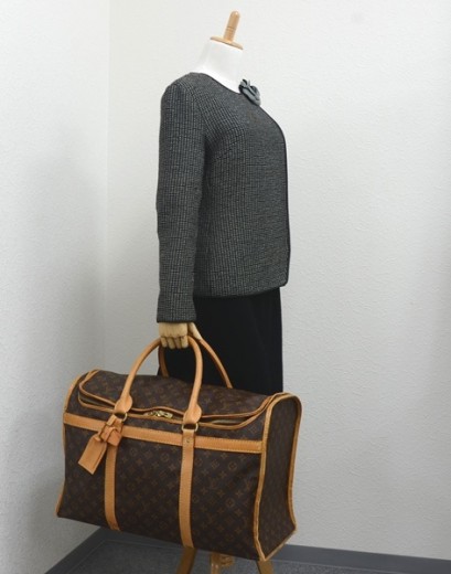 Cloth travel bag Louis Vuitton Brown in Cloth - 20585755
