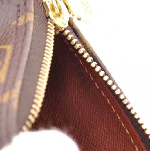 LOUIS VUITTON Monogram Mini Papillon Pochette Bag - ShopperBoard