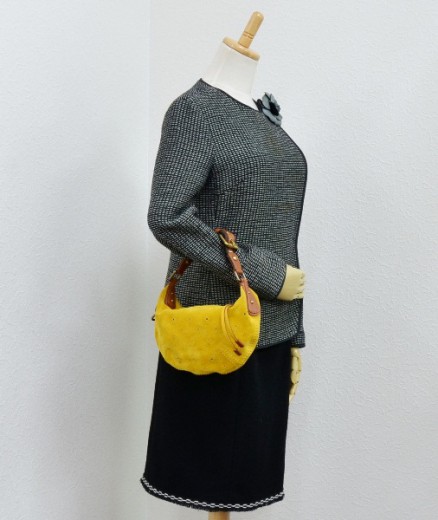 Onatah handbag Louis Vuitton Yellow in Suede - 30707628