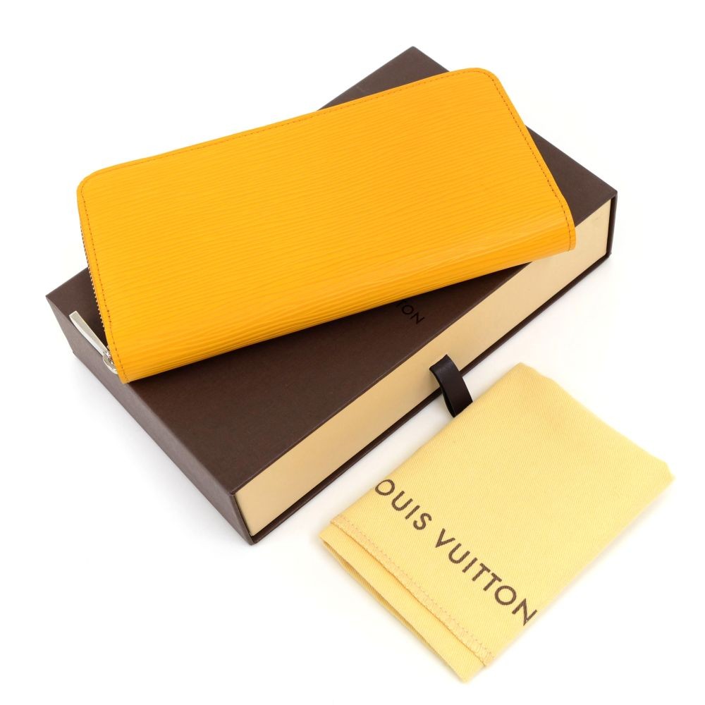 Cloth wallet Louis Vuitton Yellow in Cloth - 25699213