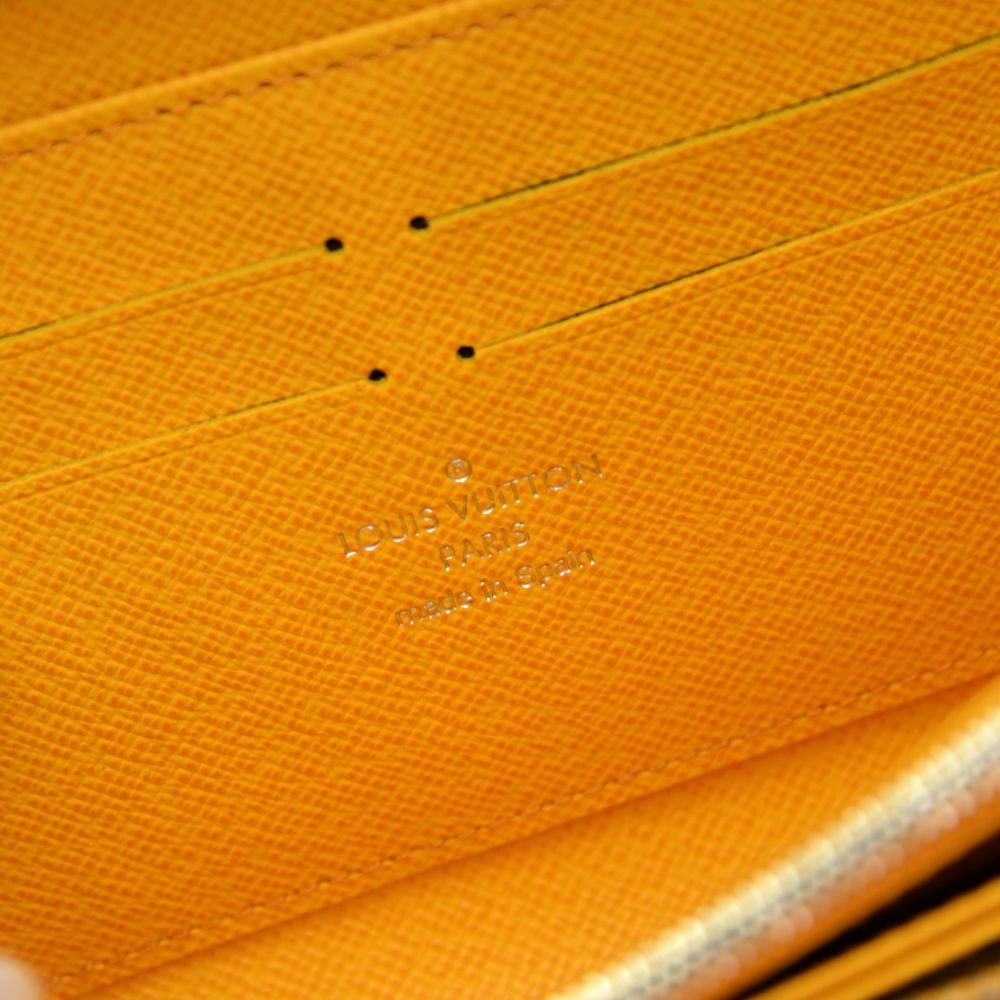 Zoé leather wallet Louis Vuitton Yellow in Leather - 24913566