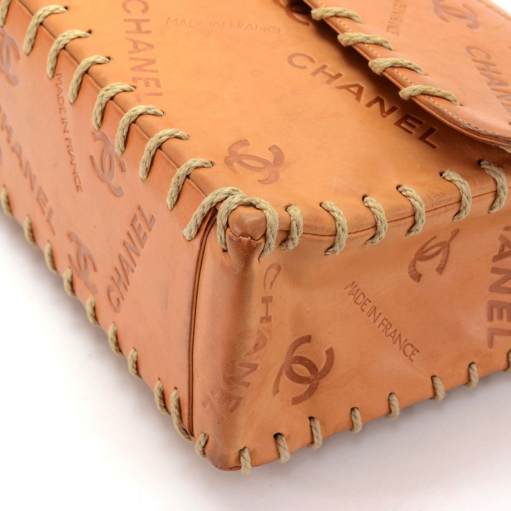 Vintage CHANEL tan brown allover logo embossed leather jumbo