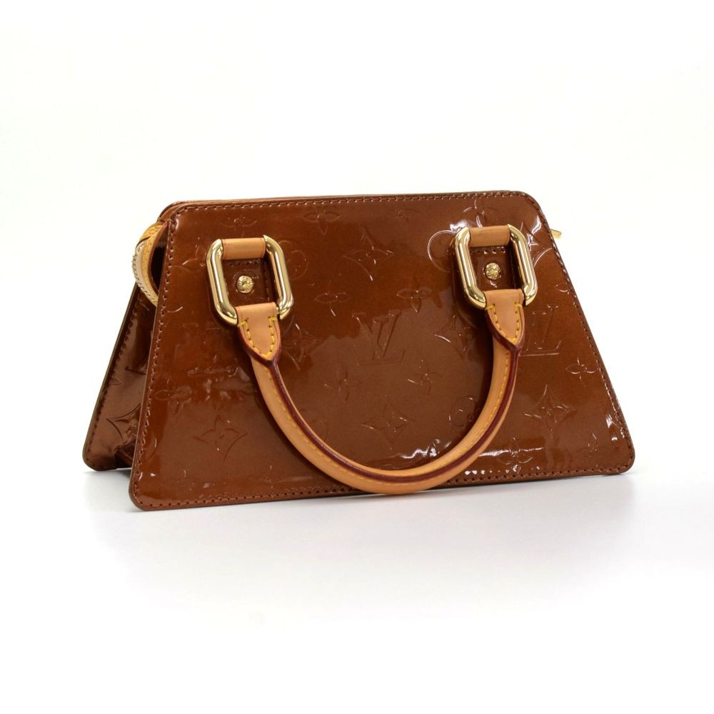 Leather purse Louis Vuitton Brown in Leather - 35351105