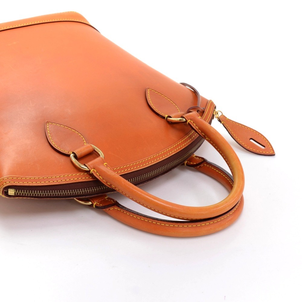 Louis Vuitton, Bags, Lockit Handbag Nomade Leather