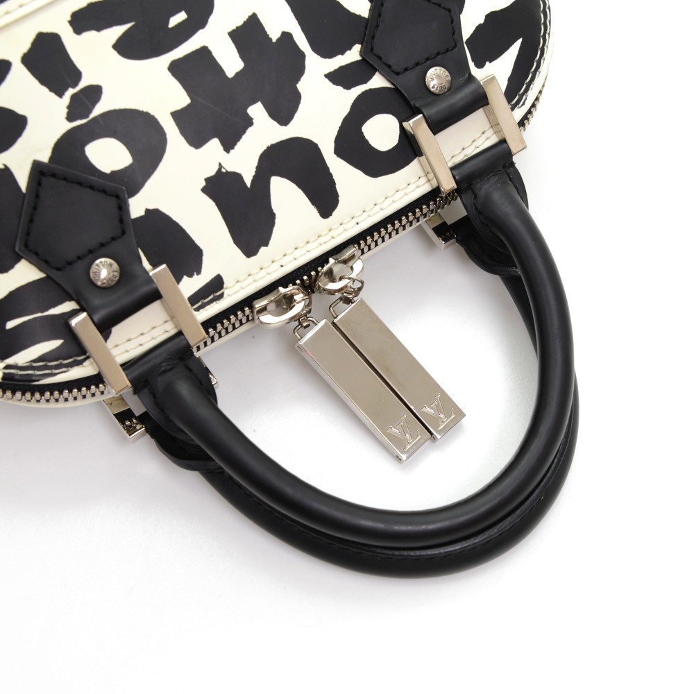 Alma graffiti leather handbag Louis Vuitton White in Leather - 32522672