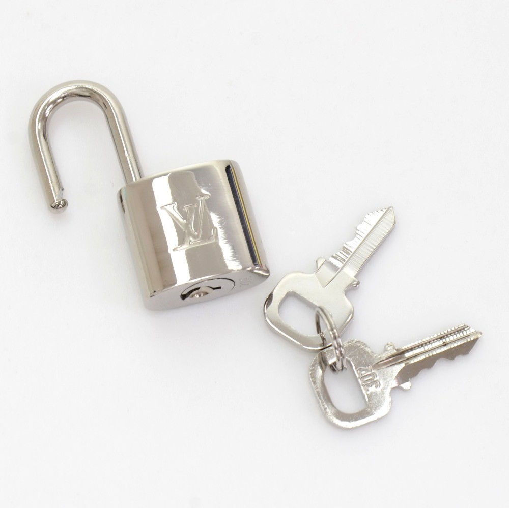 Brand New Louis Vuitton Silver Padlock and 2 keys