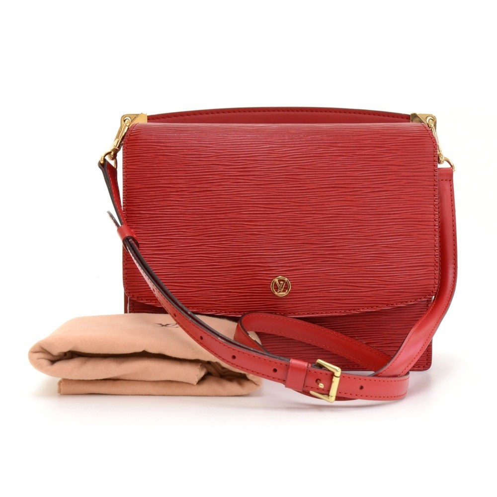 Louis Vuitton Ségur bag worn on the shoulder or carried in the hand in red  epi leather