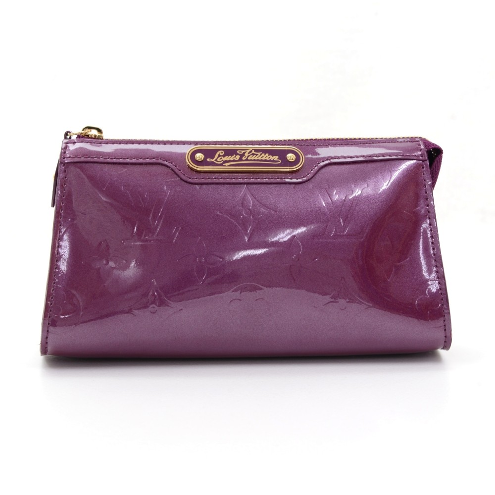 Pochette accessoire leather handbag Louis Vuitton Purple in Leather -  24566781