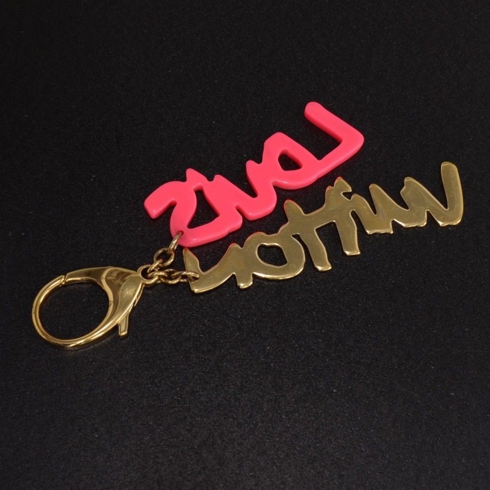 LOUIS VUITTON Portocle Stories Keyring Double Side Pink LV Tattoo