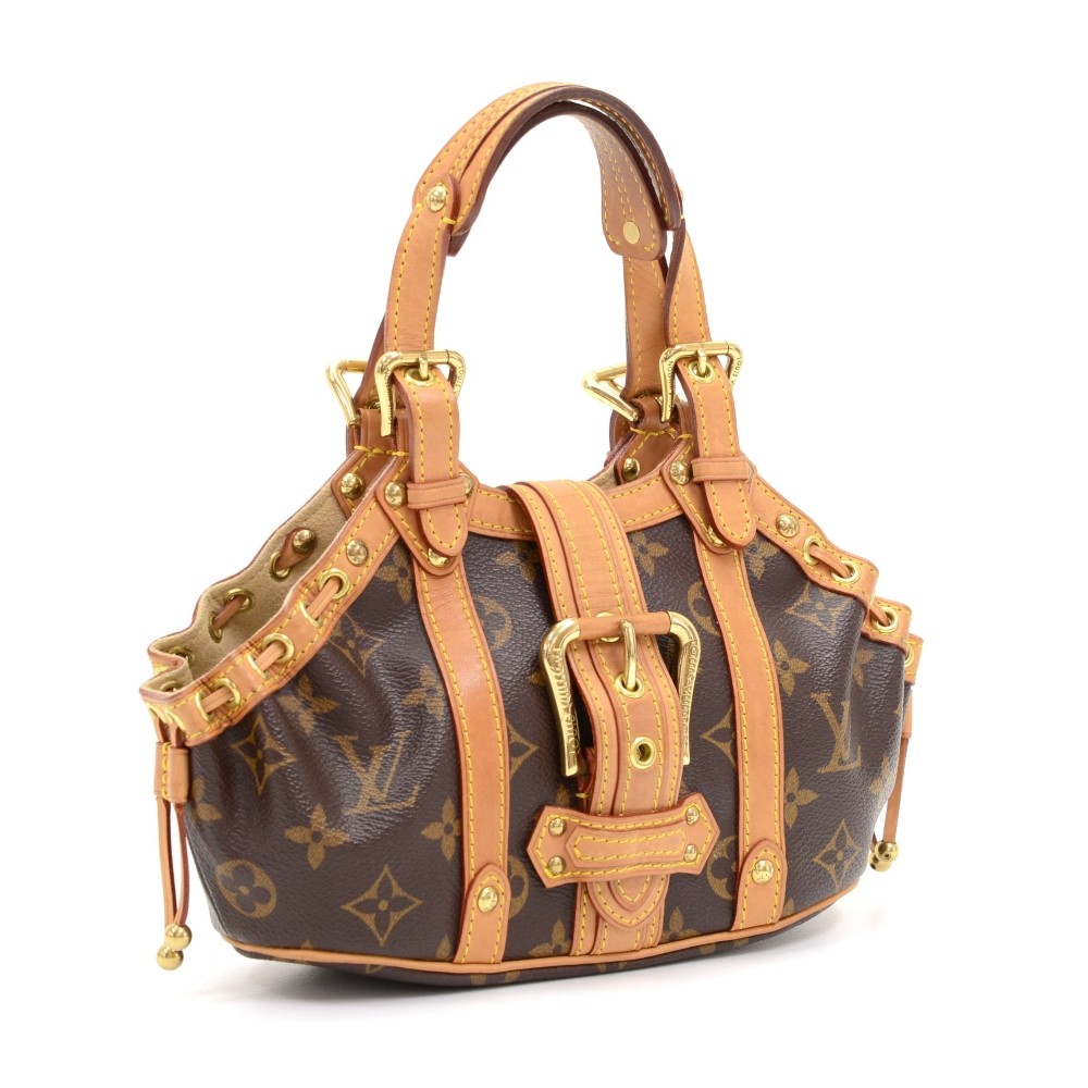 At Auction: Louis Vuitton, LOUIS VUITTON Handbag THEDA PM.