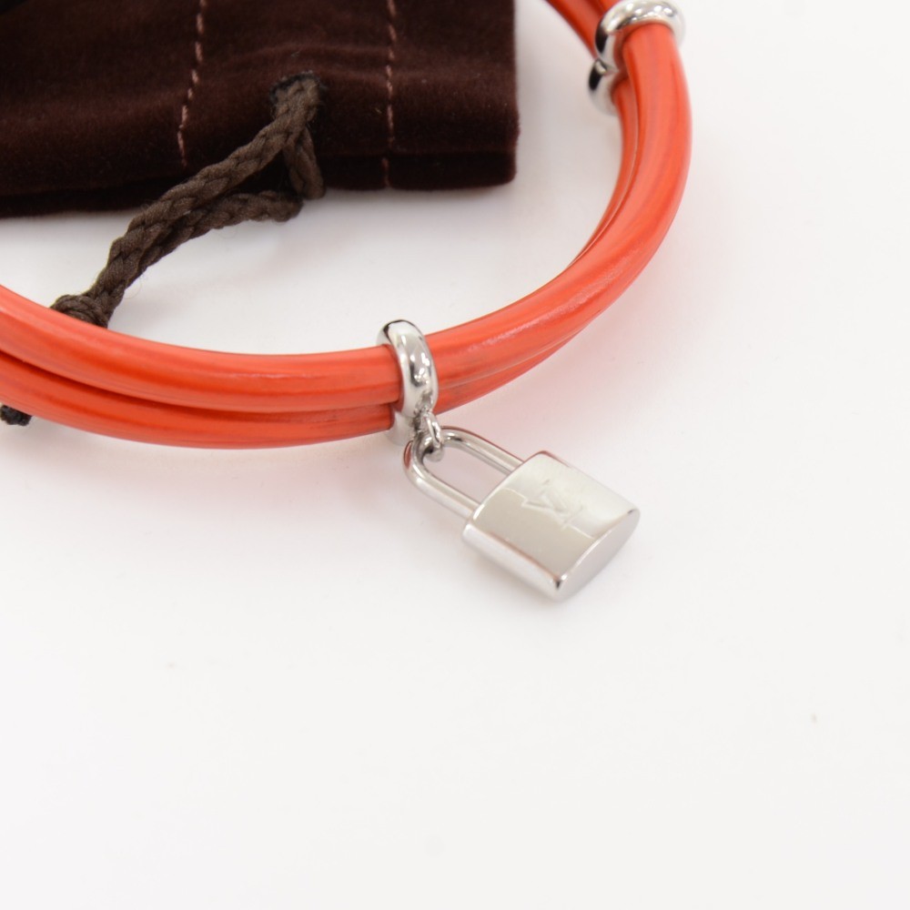 Louis Vuitton Keep It Twice Lock Charm Bracelet Orange Leather Pony-style  calfskin ref.984475 - Joli Closet