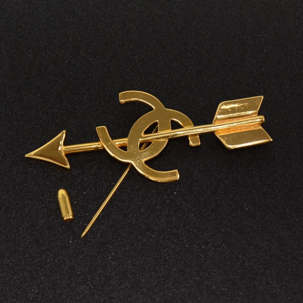 Chanel arrow brooch hot sale