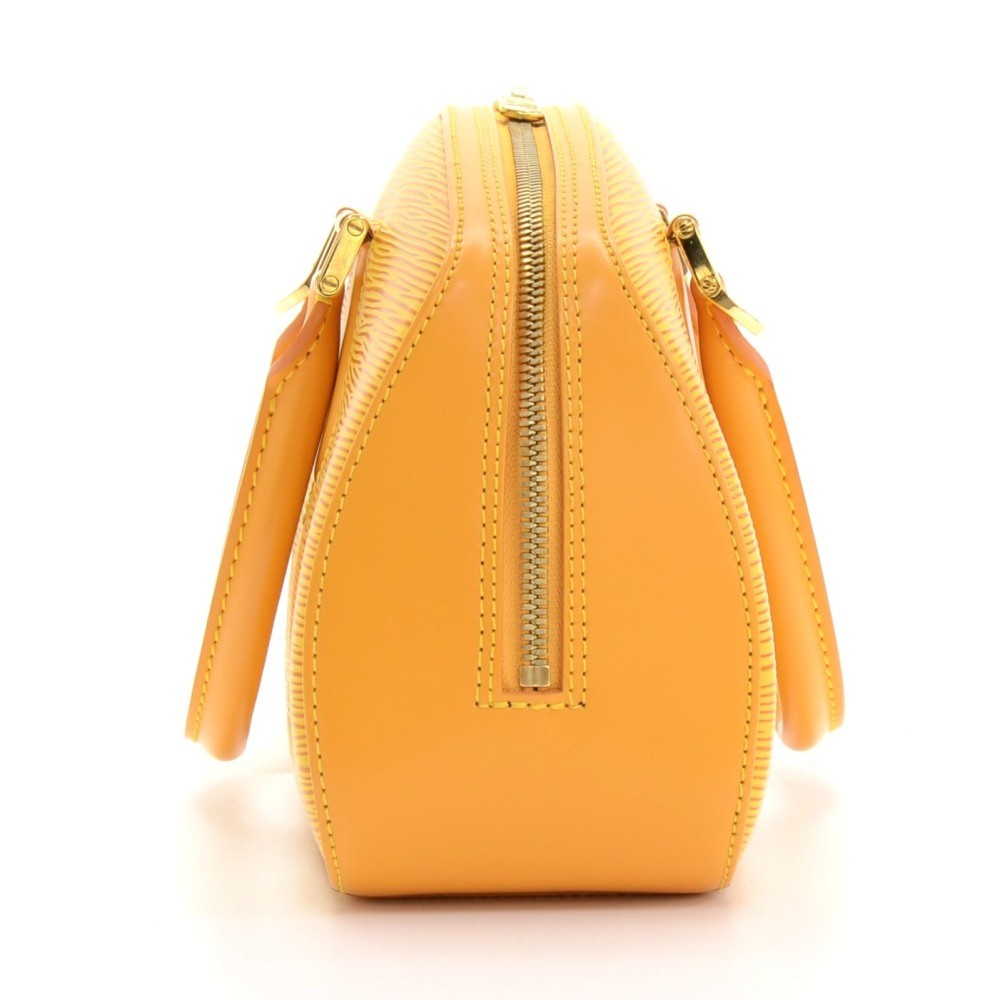 Leather purse Louis Vuitton Yellow in Leather - 37516805