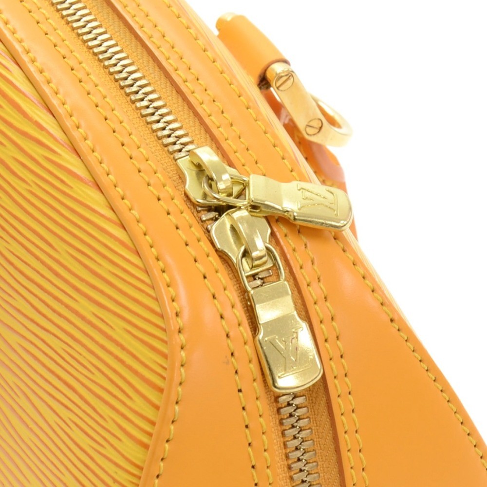 Leather handbag Louis Vuitton Yellow in Leather - 29555044