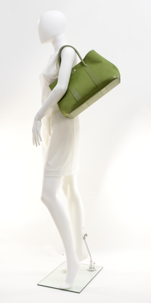 Hermès, a green canvas and brown leather 'Garden Party' bag. - Bukowskis
