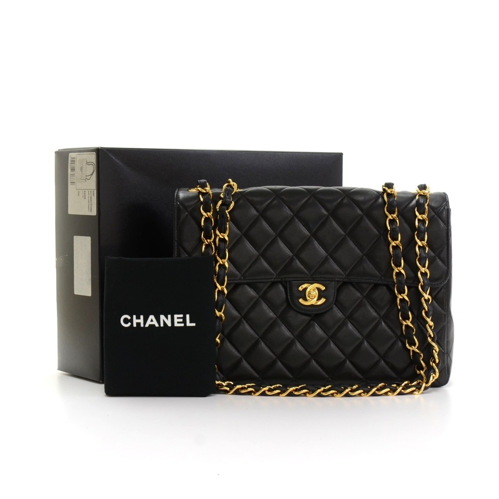 A Chanel Black Leather Millenium Bag, 12 x 10 x 4 1/2 inches. sold