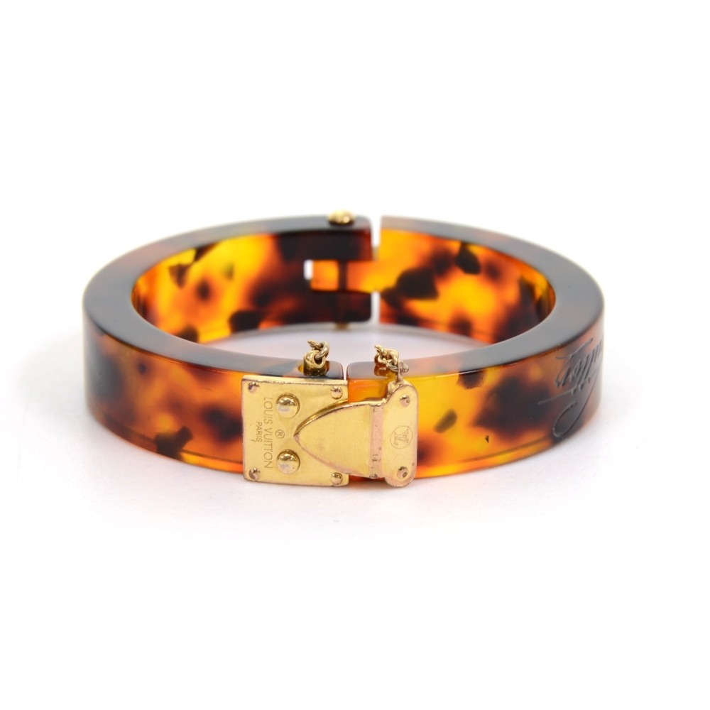 Louis Vuitton Havane Tortoise Lock Me Bangle Bracelet White gold Metal  Plastic ref.332921 - Joli Closet