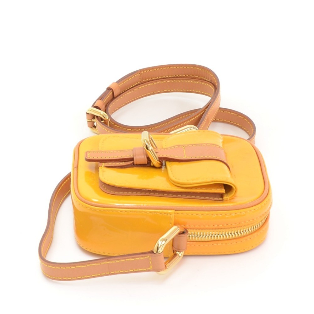 Rosalie leather clutch Louis Vuitton Yellow in Leather - 24913175