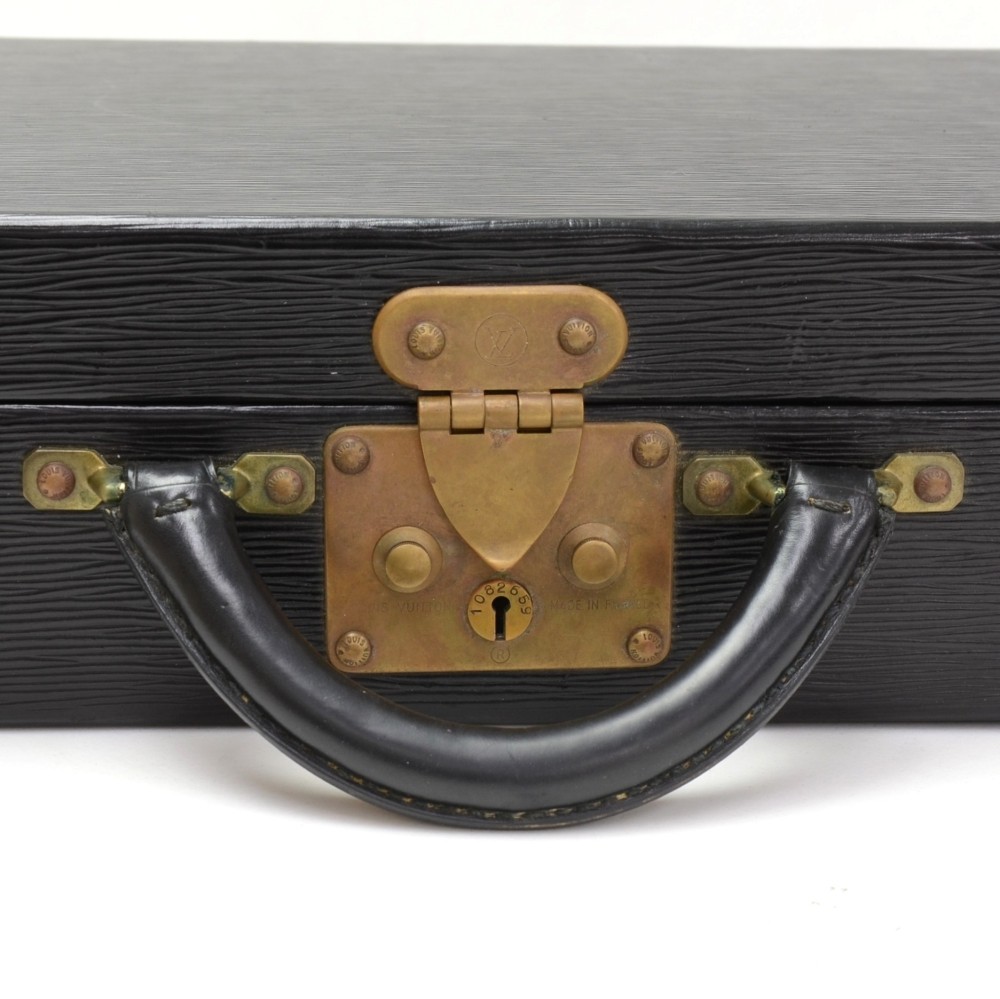LOUIS VUITTON, Black epi leather briefcase, lock on bra…