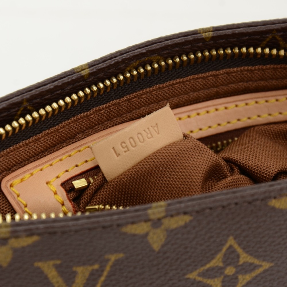 Louis Vuitton Brown Monogram Trotteur Leather Cloth ref.1022895