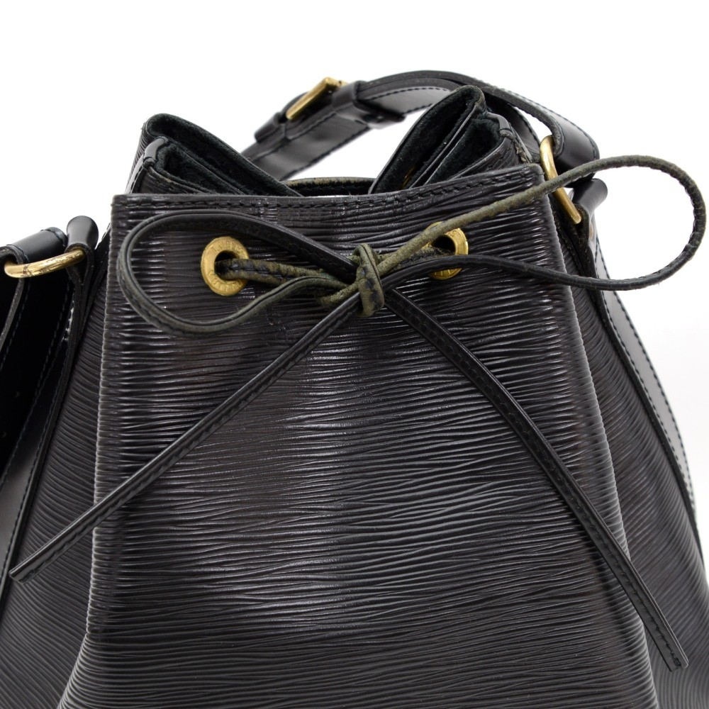 Louis Vuitton, Epi Noir Sac Noe, black textured epi leat…
