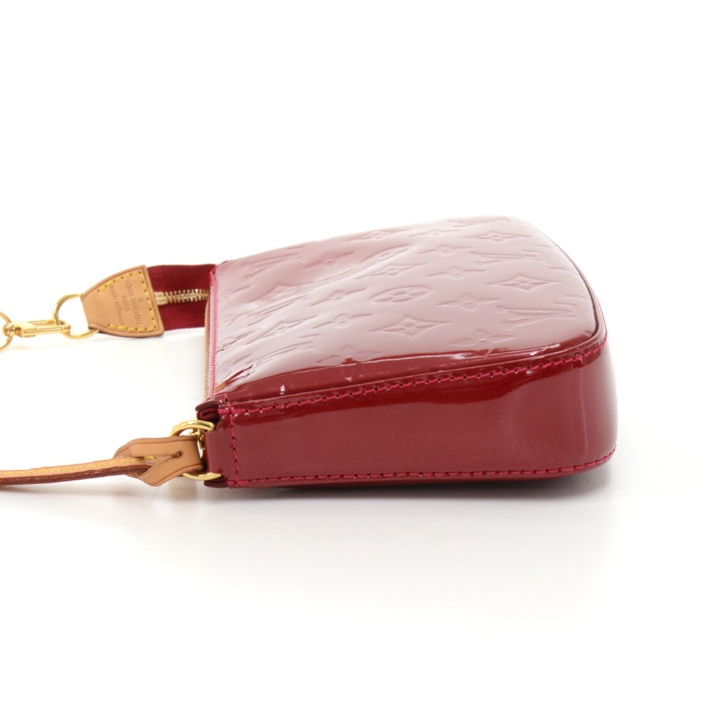 Pochette accessoire leather handbag Louis Vuitton Red in Leather - 32363825