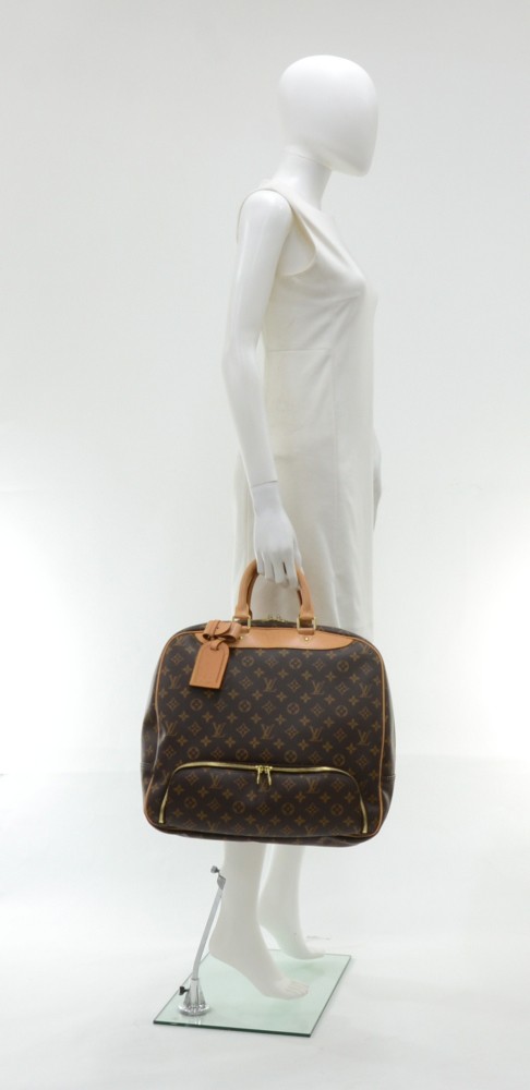 Evasion travel bag Louis Vuitton Brown in Synthetic - 37561820