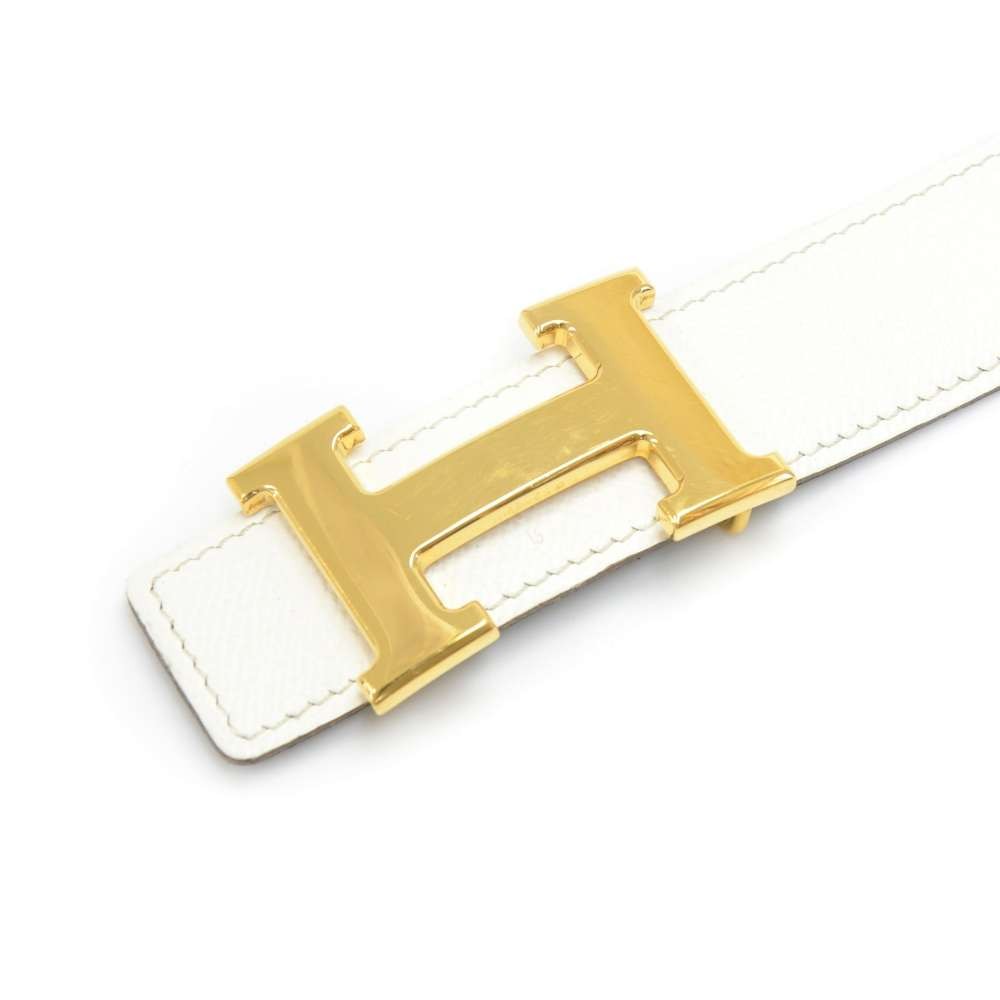 white and gold hermes belt