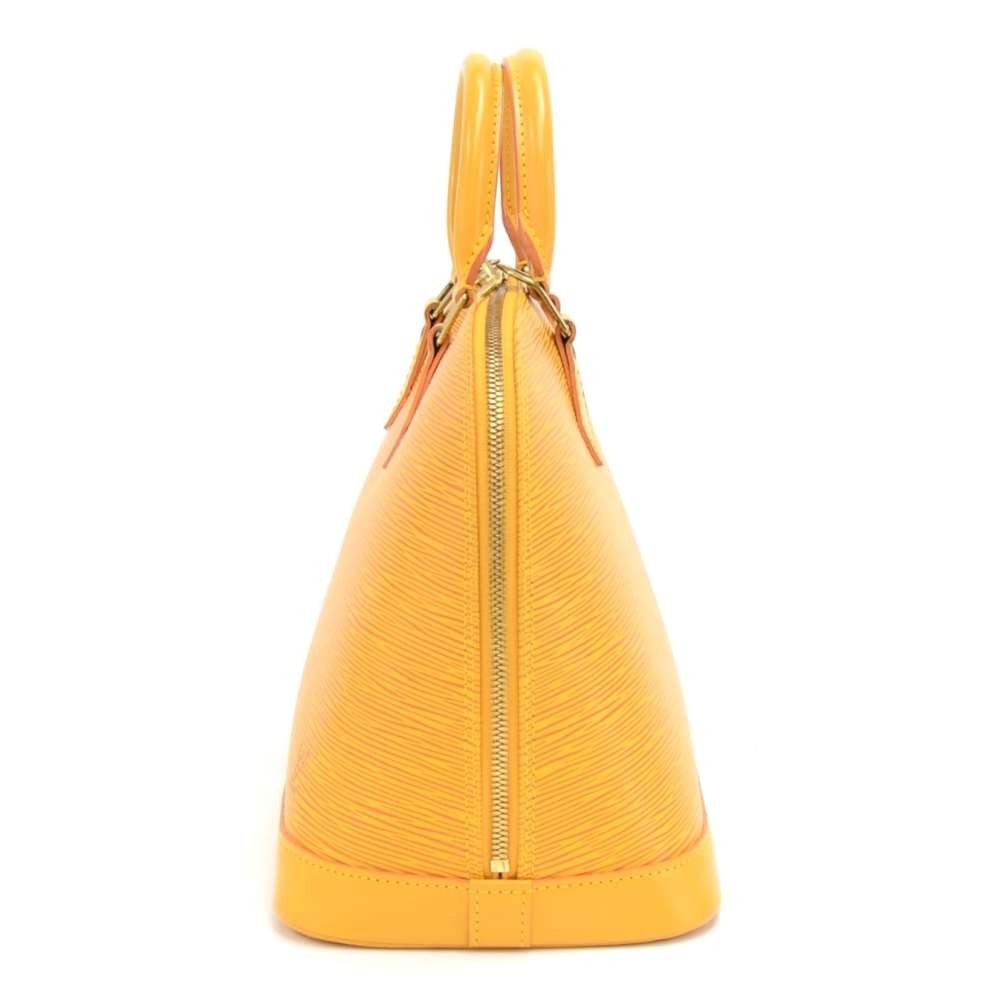 Alma leather handbag Louis Vuitton Yellow in Leather - 30177396