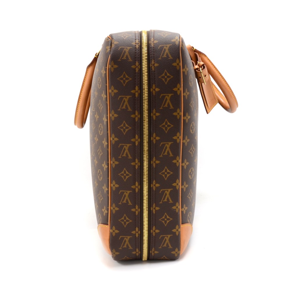 RvceShops Revival, Sac de voyage Louis Vuitton Sirius 55 en toile monogram  enduite marron et cuir naturel