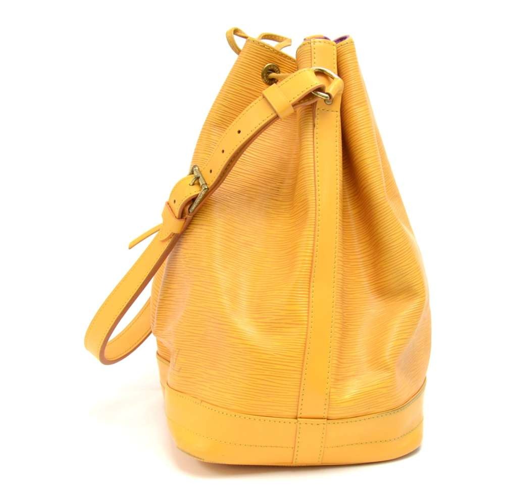Sold at Auction: LOUIS VUITTON NOE GM IN YELLOW CALF EPI LEATHER