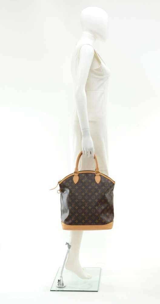 Louis Vuitton, a 'Lockit' monogram canvas handbag, 2012. - Bukowskis