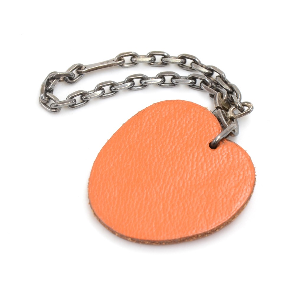 Leather bag charm Louis Vuitton Orange in Leather - 35170299