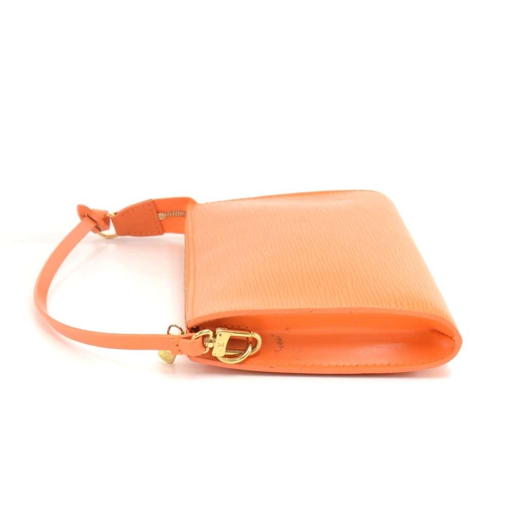 Pochette accessoire leather handbag Louis Vuitton Orange in Leather -  31540617