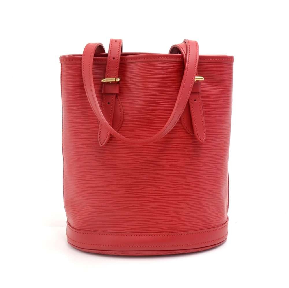LOUIS VUITTON. Bucket bag in red epi leather, model Noé…