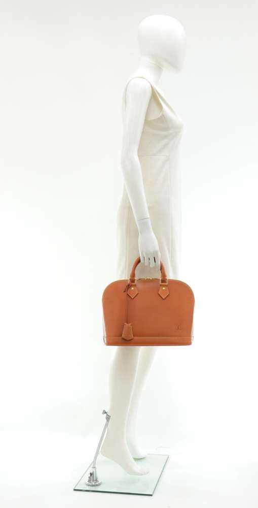 Louis Vuitton Louis Vuitton Alma Brown Nomade Leather Handbag