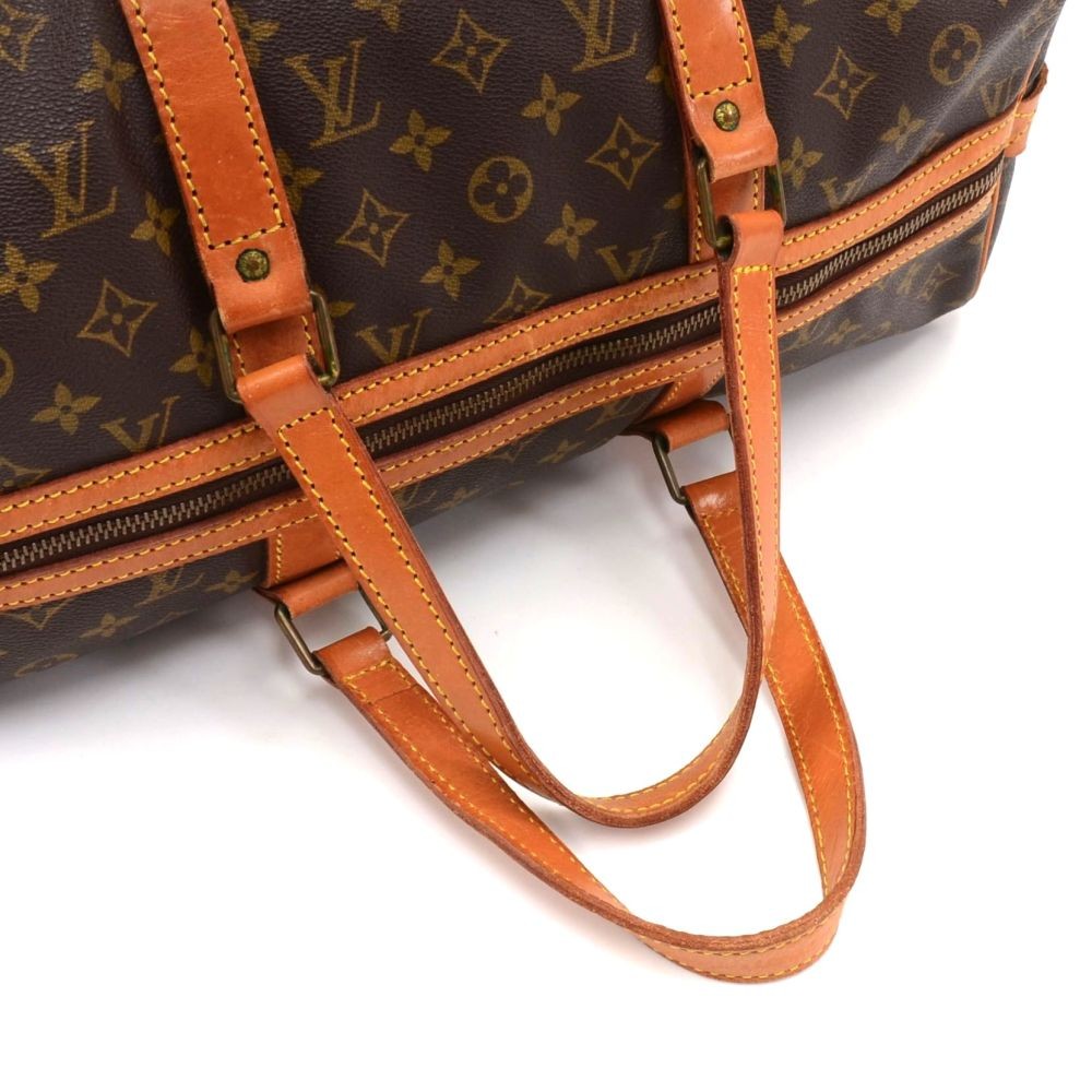 Sac souple cloth travel bag Louis Vuitton Brown in Cloth - 25093589