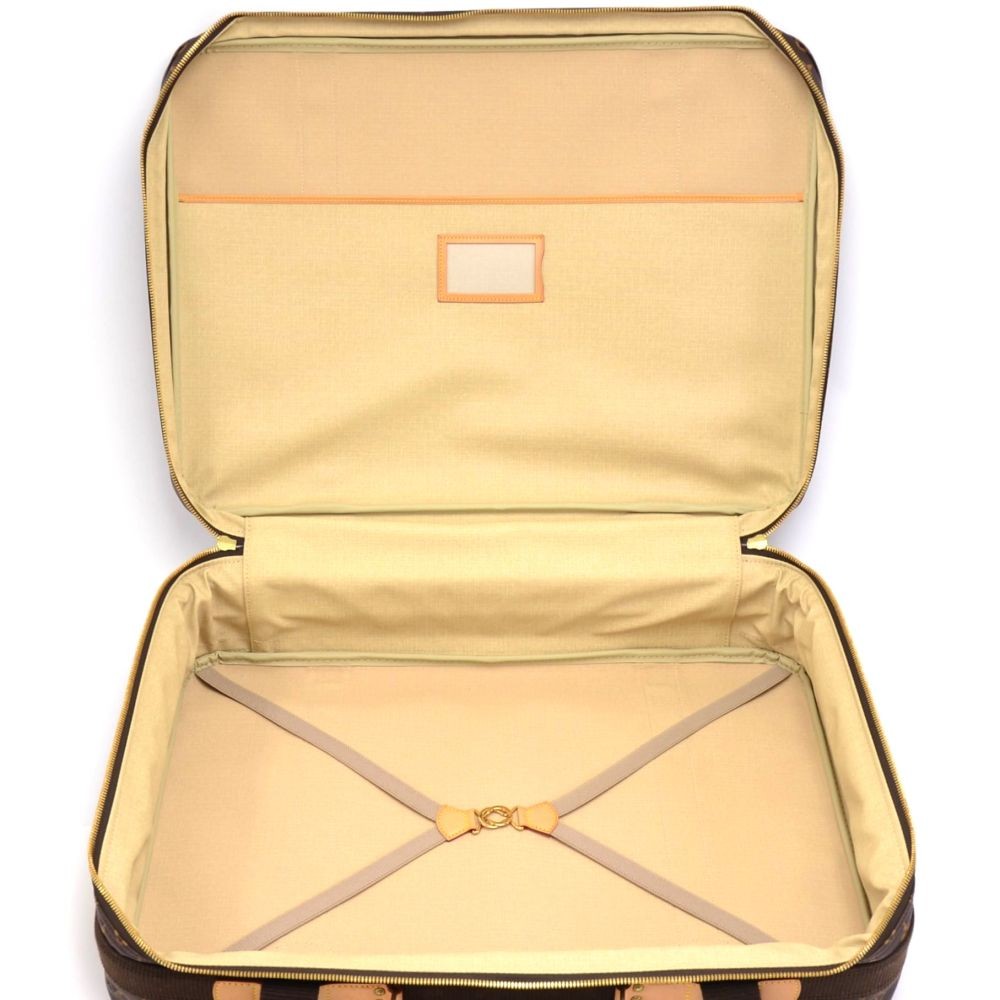 Louis Vuitton, a monogram canvas 'Pégase 60' suitcase, 2004. - Bukowskis