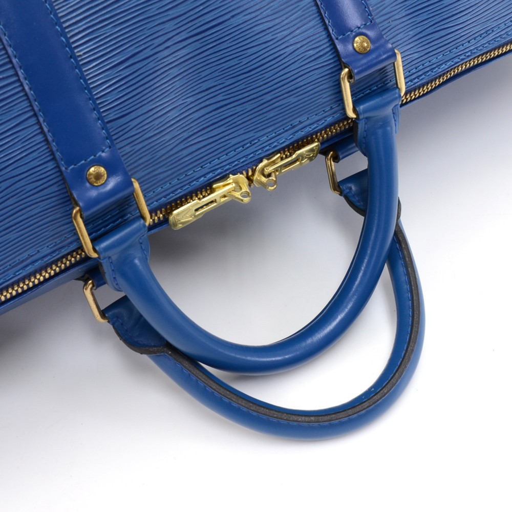 Vintage Louis Vuitton Keepall 55 Blue Epi Leather Duffle Travel Bag at  1stDibs  blue louis vuitton duffle bag, epi leather duffle bag, vintage louis  vuitton duffle