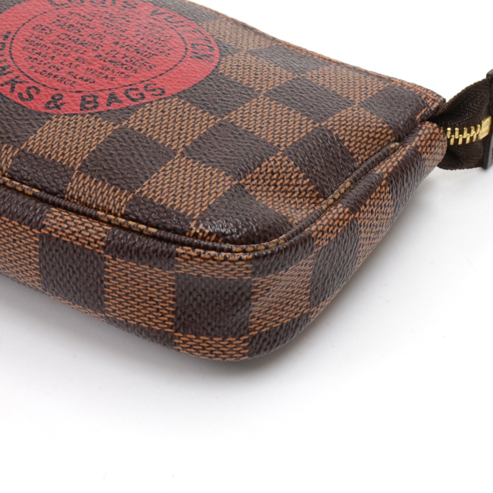Pochette accessoire mini bag Louis Vuitton Brown in Cotton - 36541439