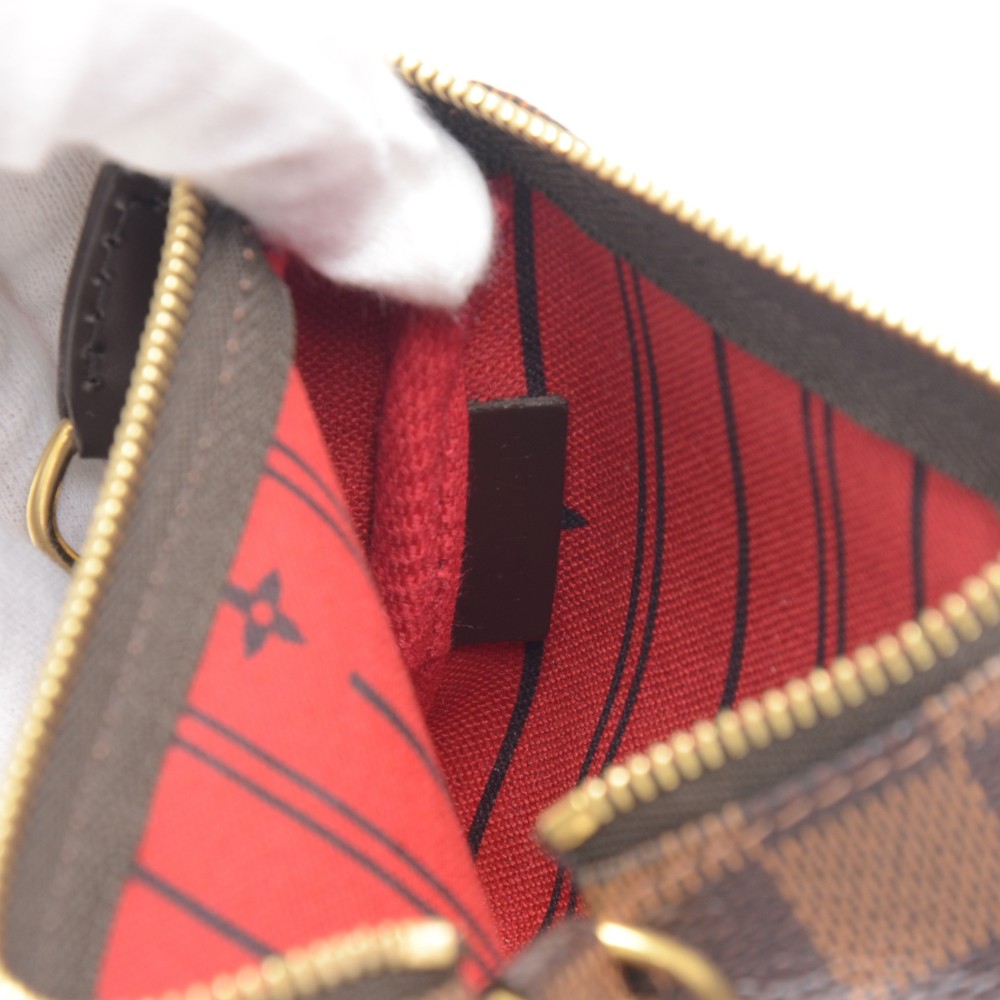 Louis Vuitton Mini Pochette Accessoires Damier Ebene Canvas Brown Pris -  BougieHabit