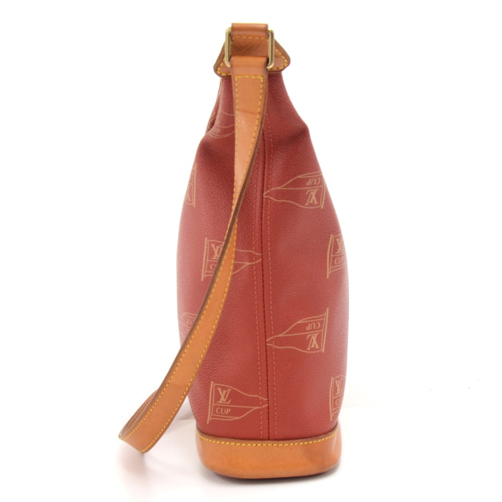 Louis Vuitton Vintage Red LV Cup Coated Canvas Saint-Tropez Drawstring  Backpack Gold Hardware, 1995 Available For Immediate Sale At Sotheby's